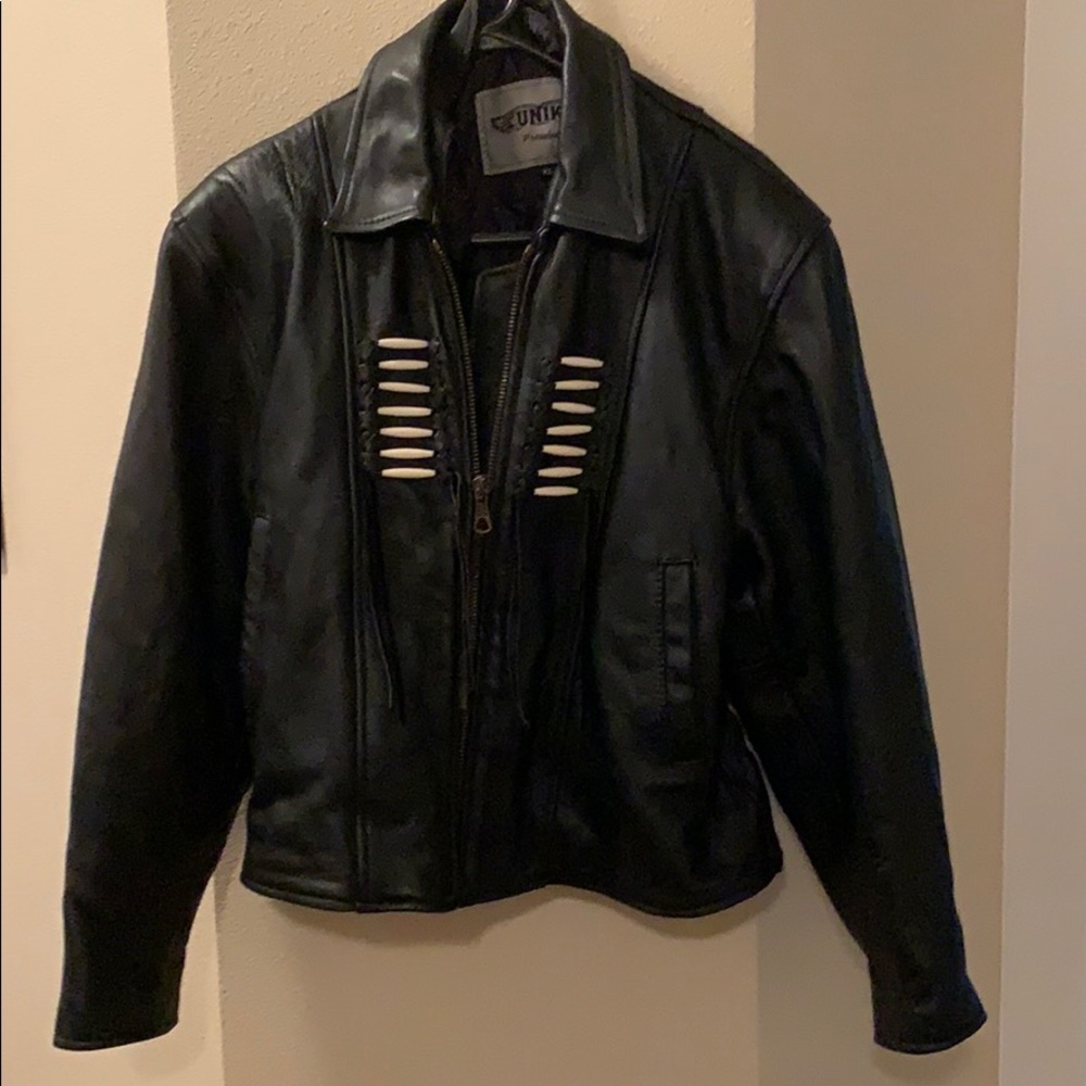 Black leather riding coat . Measurements: chest 17 , shoulder  20.   Waist 22